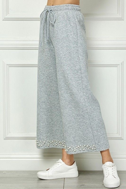 Textured Pearl Hem Cropped Pants sold by A Velvet Window