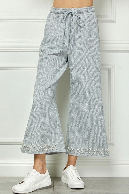 Textured Pearl Hem Cropped Pants sold by A Velvet Window