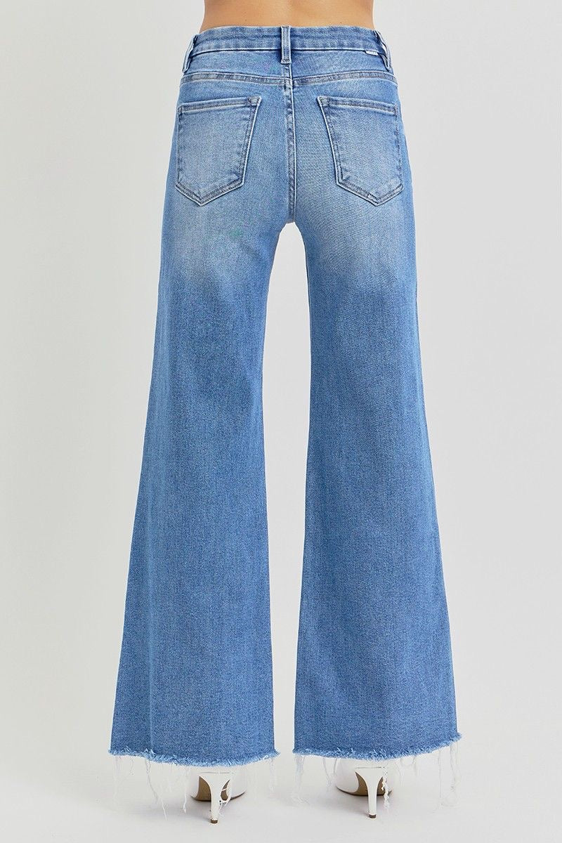 Risen Mid-Rise Wide Leg Jeans sold by A Velvet Window