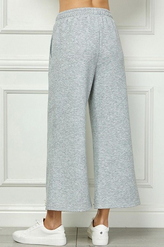 Textured Pearl Hem Cropped Pants sold by A Velvet Window