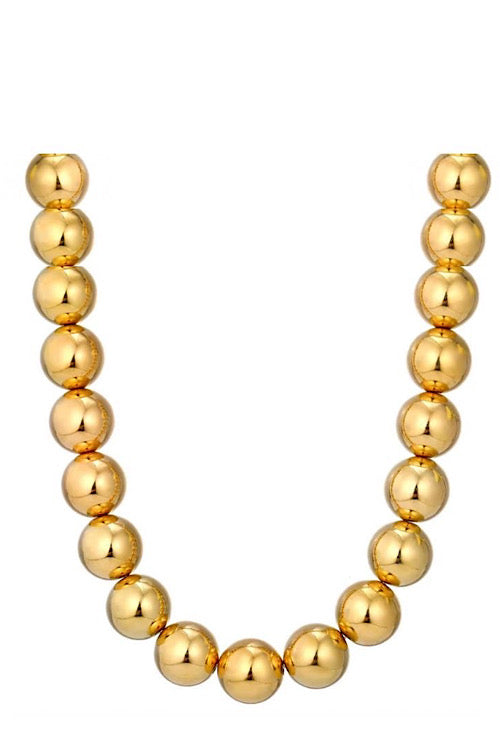 Golden Sphere Necklace sold by A Velvet Window