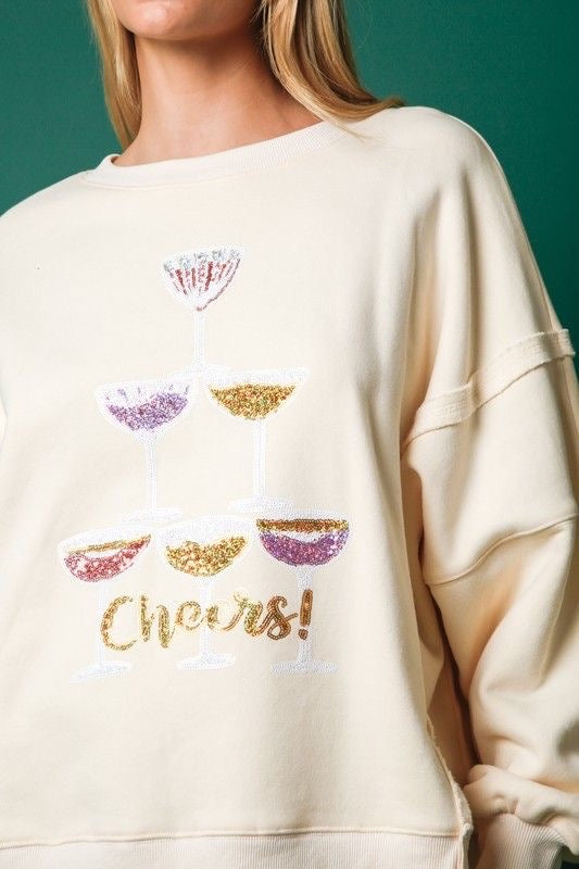 "CHEERS" Sequin Graphic Sweatshirt sold by A Velvet Window